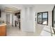 Hallway providing entry to kitchen and living spaces at 9425 Blind Pass Rd # 1008, St Pete Beach, FL 33706