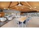Community lounge offering a blend of seating arrangements, including tables, chairs, and lounge seating at 9425 Blind Pass Rd # 1008, St Pete Beach, FL 33706