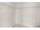 Walk-in closet with wire shelving at 9425 Blind Pass Rd # 1008, St Pete Beach, FL 33706