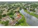 Aerial shot of a residential neighborhood with a nearby lake and golf course at 1012 Radison Lake Ct # 59, Sun City Center, FL 33573