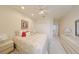 Bedroom featuring neutral carpeting, window, and standard closet at 1012 Radison Lake Ct # 59, Sun City Center, FL 33573