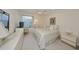 Bedroom with neutral carpeting, window, and matching furniture at 1012 Radison Lake Ct # 59, Sun City Center, FL 33573