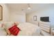 Bedroom with neutral carpeting, window, and furniture at 1012 Radison Lake Ct # 59, Sun City Center, FL 33573