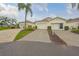 Well-maintained home featuring a two-car garage, a beautifully landscaped yard, and a charming curb appeal at 1012 Radison Lake Ct # 59, Sun City Center, FL 33573