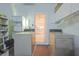 Functional laundry room with washer and dryer, conveniently located near the kitchen at 1012 Radison Lake Ct # 59, Sun City Center, FL 33573