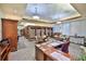 A quiet library with shelves stocked with books and tables for reading and research provides a peaceful retreat at 1012 Radison Lake Ct # 59, Sun City Center, FL 33573