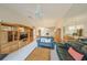 Inviting living space featuring dual sofas, a large coffee table, and an entertainment center at 1012 Radison Lake Ct # 59, Sun City Center, FL 33573