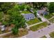 Aerial view of home showcasing well-manicured front lawn at 109 Magnolia Ave, Seffner, FL 33584