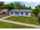 Beautiful home featuring well manicured yard and a charming exterior at 109 Magnolia Ave, Seffner, FL 33584