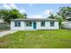 Charming single story home with a well manicured front lawn at 109 Magnolia Ave, Seffner, FL 33584