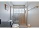 Full bathroom with tiled shower, granite counter and modern fixtures at 117 Connie Ave, Tampa, FL 33613
