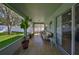 Spacious screened lanai with tile flooring, perfect for entertaining and enjoying the outdoors at 11806 Holly Crest Ln, Riverview, FL 33569