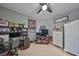 Spacious office with tile floors and a ceiling fan offers ample storage and display space at 11806 Holly Crest Ln, Riverview, FL 33569