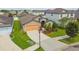 Beautiful single-Gathering home with a two-car garage and well-manicured landscaping at 11837 Thicket Wood Dr, Riverview, FL 33579