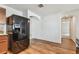 Spacious kitchen features modern appliances and view of adjacent room at 11837 Thicket Wood Dr, Riverview, FL 33579
