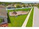 Aerial view of a community playground in a residential area, perfect for outdoor Gathering activities at 11837 Thicket Wood Dr, Riverview, FL 33579