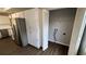 Laundry area featuring white cabinets, washer and dryer hookups, and a laundry closet at 12804 Millridge Forest St, Tampa, FL 33624