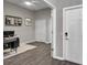 Office space with laminate flooring, computer and shelf system at 13910 Chalk Hill Pl, Riverview, FL 33579