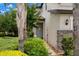 Charming exterior of home boasts manicured landscaping and inviting entry at 1395 White Fox Run, Lutz, FL 33549
