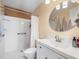 Clean bathroom with a modern vanity, walk-in shower, and neutral color palette at 213 Fernwood Cir # 213, Seminole, FL 33777