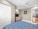 Bright bedroom with natural light, tile floors, and neutral color tones at 213 Fernwood Cir # 213, Seminole, FL 33777