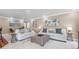 Inviting living space with twin couches and neutral coastal decor at 213 Fernwood Cir # 213, Seminole, FL 33777