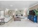 Inviting living room with neutral colors, plush seating, and a large, decorative area rug at 213 Fernwood Cir # 213, Seminole, FL 33777
