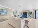 Comfortable living room with modern furniture and large windows, great for relaxation at 213 Fernwood Cir # 213, Seminole, FL 33777