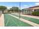 Community amenities showcasing shuffleboard courts, pool area and covered seating at 213 Fernwood Cir # 213, Seminole, FL 33777