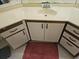 Bathroom featuring sink, vanity, cabinets, drawers, countertop, and mirror at 2333 Feather Sound Dr # A401, Clearwater, FL 33762