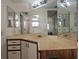 Bathroom featuring a large mirror and spacious vanity at 2333 Feather Sound Dr # A401, Clearwater, FL 33762