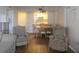Open floor plan showing the living room, dining area, and a glimpse of the kitchen at 2333 Feather Sound Dr # A401, Clearwater, FL 33762
