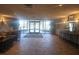 Bright lobby with tiled floors, comfortable seating and decorative lighting fixtures at 2333 Feather Sound Dr # A401, Clearwater, FL 33762