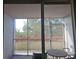 Spacious screened patio with outdoor seating, offering a peaceful view of lush greenery at 2333 Feather Sound Dr # A401, Clearwater, FL 33762