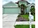 Charming single-Gathering home featuring a well-manicured lawn and beautiful curb appeal at 2511 Indian Key Dr, Holiday, FL 34691