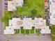 Overhead view of condo building with green spaces and a parking lot for residents at 2834 Somerset Park Dr, Tampa, FL 33613