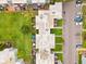 Overhead view of a condo building with green spaces, landscaping and parking at 2834 Somerset Park Dr, Tampa, FL 33613