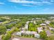 Aerial view of the community highlighting landscaping, parking, and proximity to amenities at 2834 Somerset Park Dr, Tampa, FL 33613