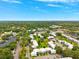 View of a neighborhood from above showcasing the landscaping and green spaces within at 2834 Somerset Park Dr, Tampa, FL 33613