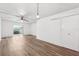 Bright, open living space with modern flooring and slider doors that provide outdoor access at 2834 Somerset Park Dr, Tampa, FL 33613