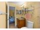 Well lit bathroom with updated vanity at 3018 59Th S St # 209, Gulfport, FL 33707