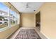 Bedroom with large windows offering a view at 3018 59Th S St # 209, Gulfport, FL 33707