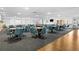 Bright meeting room featuring wood flooring, carpet, and multiple round tables with comfortable seating at 3018 59Th S St # 209, Gulfport, FL 33707