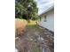Spacious backyard with a wood fence, providing privacy at 3118 Adrian Ave, Largo, FL 33774