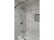 Bathroom featuring a shower/tub combination with marble surround and chrome fixtures at 3118 Adrian Ave, Largo, FL 33774