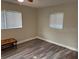 Bedroom with hardwood floors, natural light, and neutral paint at 3118 Adrian Ave, Largo, FL 33774