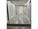 Entryway with wood-look floors, a front door, and neutral paint colors at 3118 Adrian Ave, Largo, FL 33774