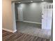 Hallway featuring fresh paint and modern flooring at 3118 Adrian Ave, Largo, FL 33774