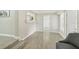 Comfortable living room with gray chairs, hard floors, and view to adjacent rooms at 3118 Adrian Ave, Largo, FL 33774