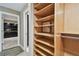 Large closet with shelving and rods for organizing clothes and accessories at 3308 Landing Pl, Palm Harbor, FL 34684